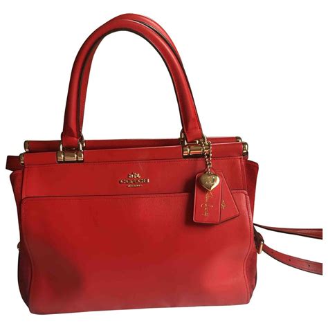 coach purse under 100 dollars.